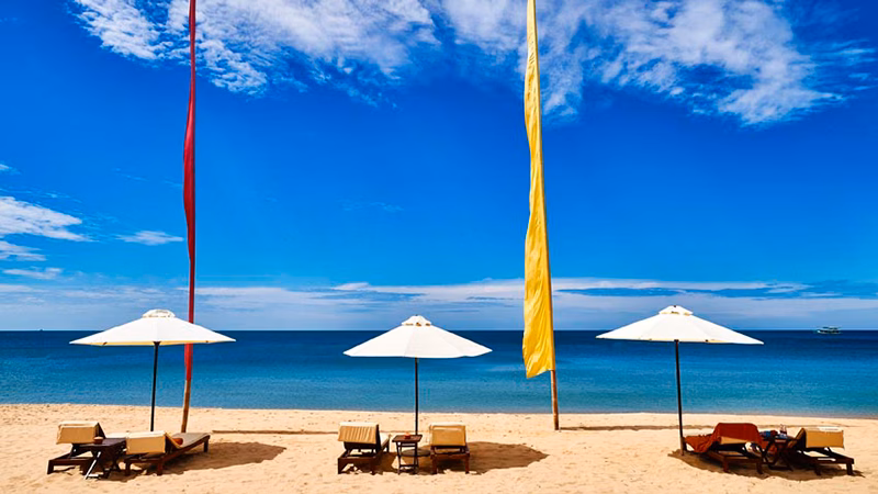 Lounge Chairs And Beach Umbrellas