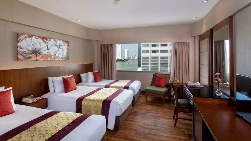 Ramada Deluxe Gallery Deluxe Triple Photo X